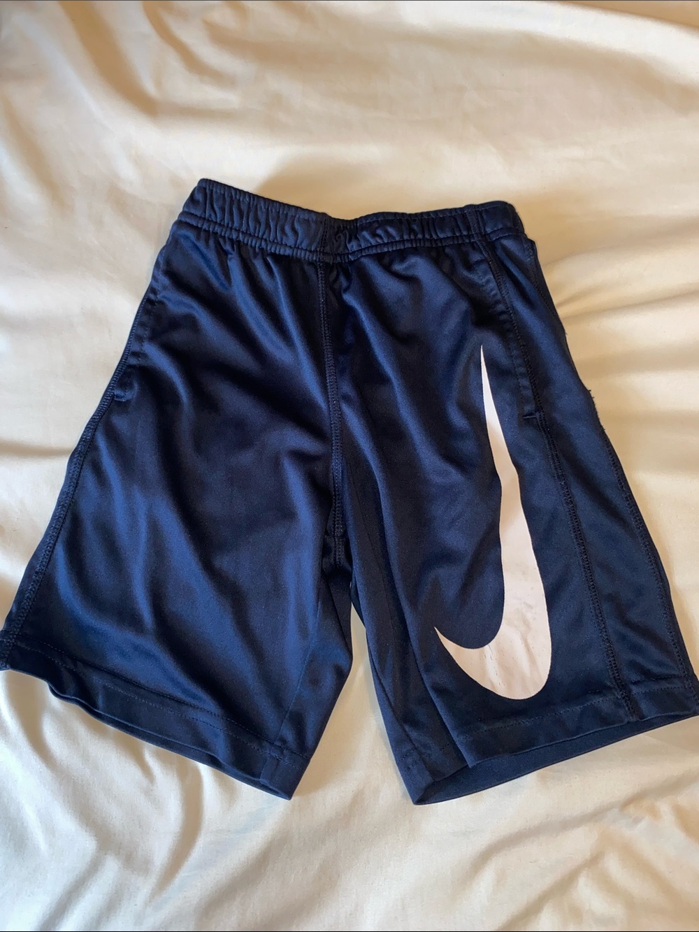 Nike Navy Blue Kids Athletic Shorts with White Swoosh